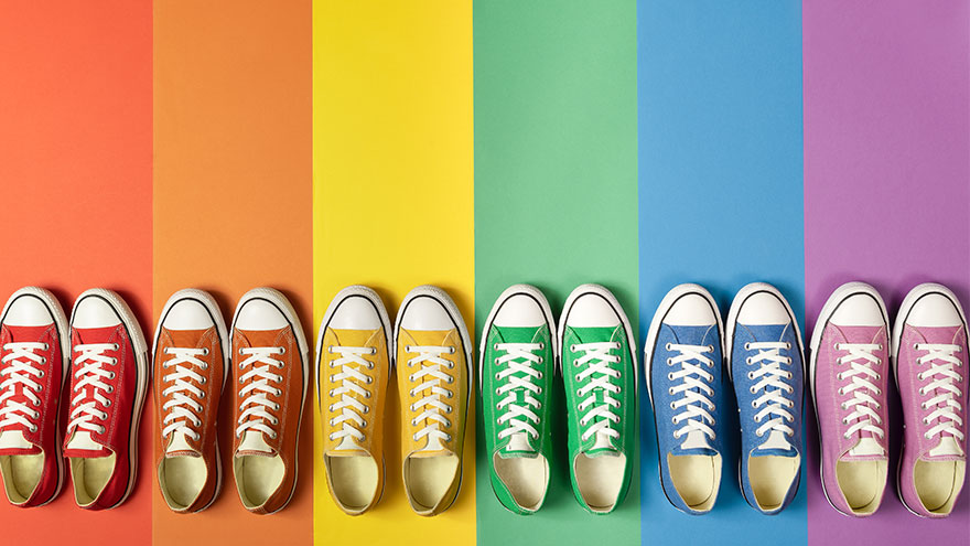 Sneakers matching the colors of the LGBT rainbow flag, or gay pride flag