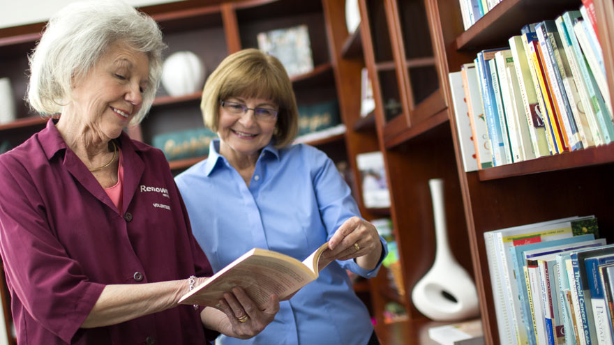 Renown Health volunteer helping patient with cancer information