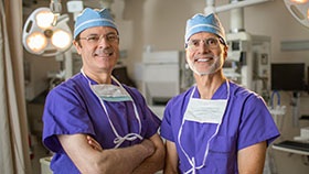 heart surgeons smiling